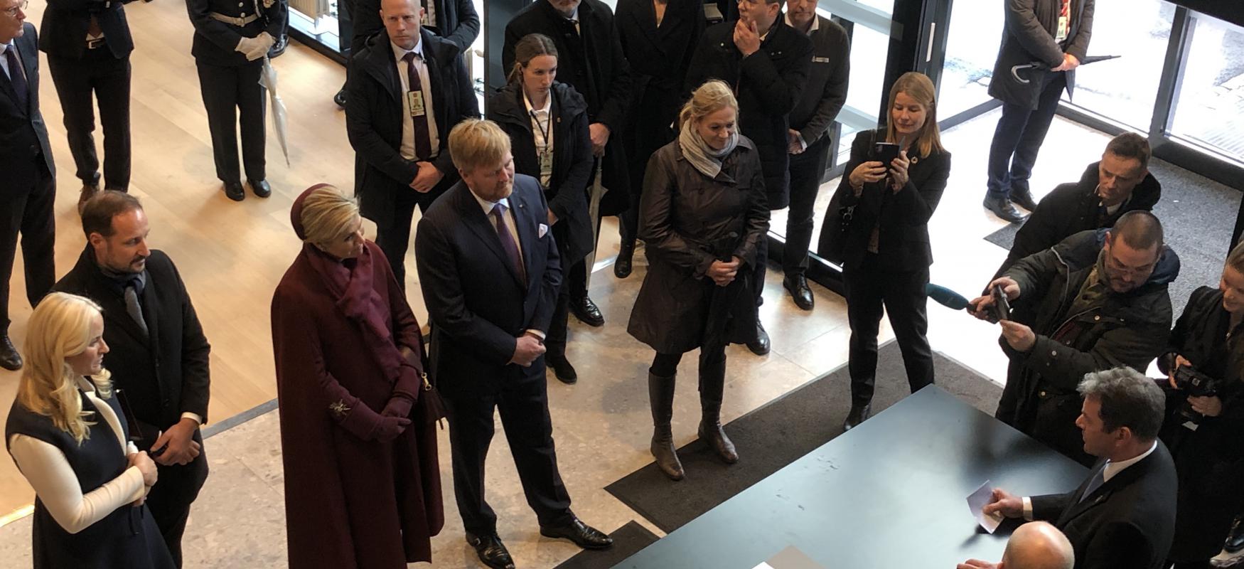 The dutch and Norwegian royal families witnessing the signing of a partnership agreement