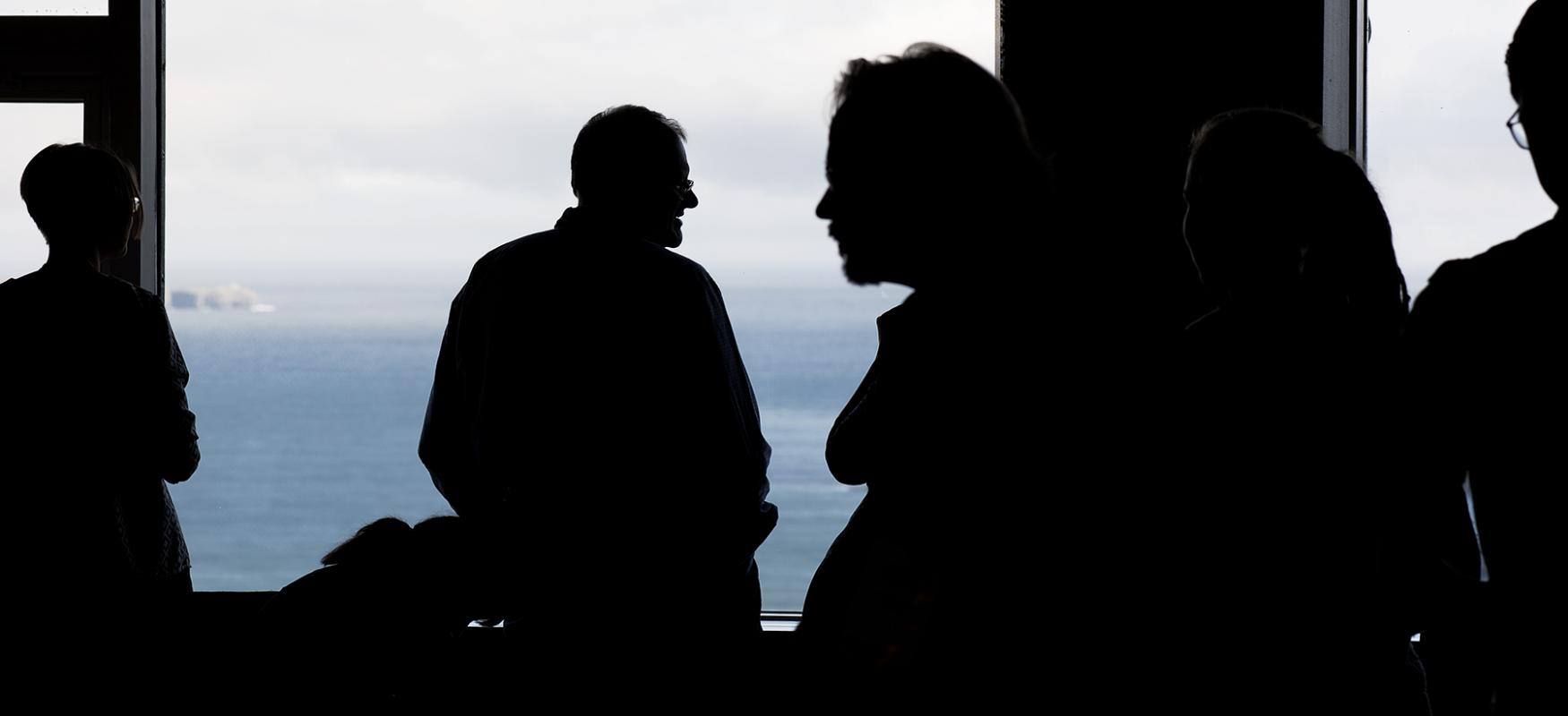 Nordic Seaweed conference people in front of window with view of Faroe Islands