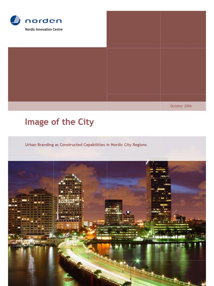 Image of the publication frontpage showing the waterfront of a city at night.